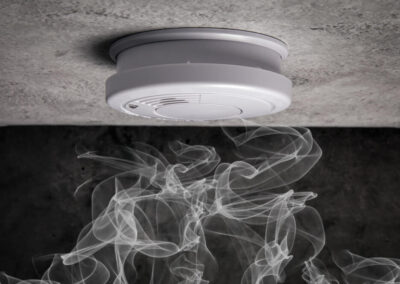 smoke alarm with smoke around it